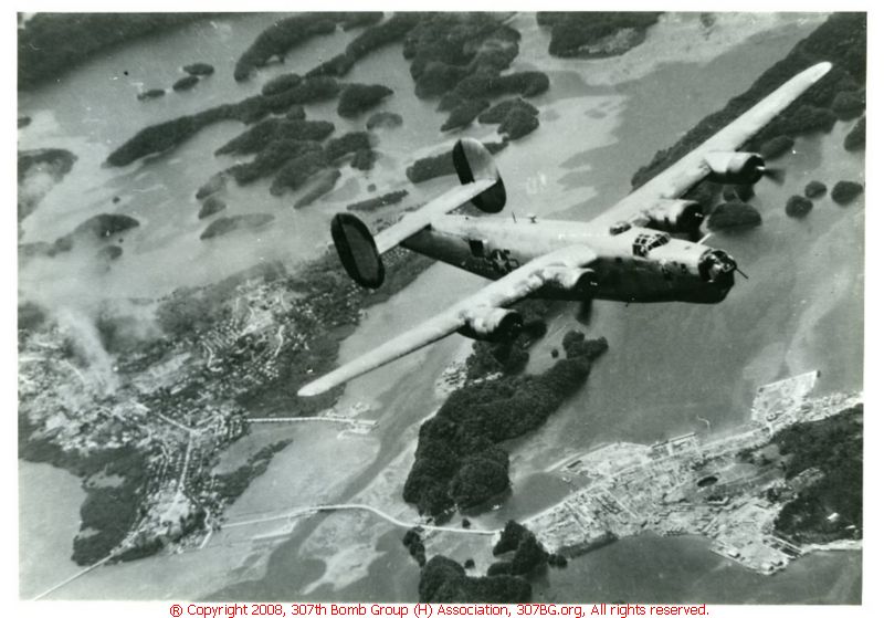 Black and white aerial photo of a B-17 bomber.